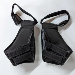 Fairtex Compact Thigh Trainer Kick Pads TP4 -Boxing Equipment Store FairtexTP4ThighPadProtectorBlackWhite